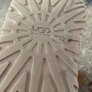 Chestnut color/brown UGGs bows up the back good shape big girls size two.